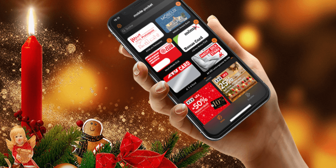 mobile-pocket Account mit Kundenkarten auf dem Smartphone, weihnachtlicher Hintergrund.